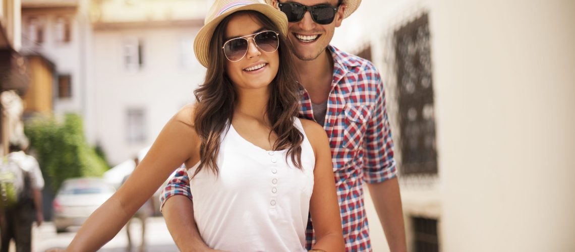 Cute young couple with bike