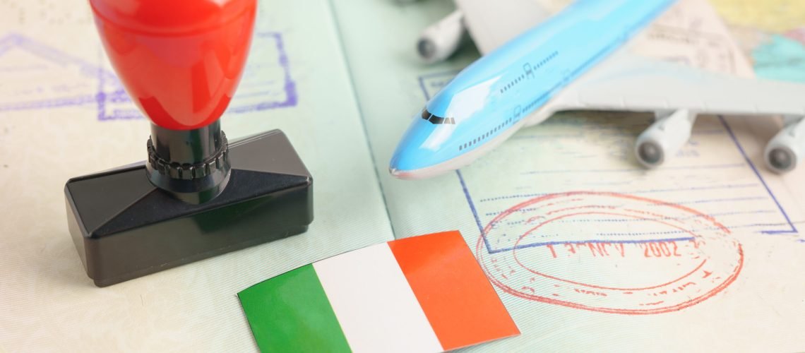 Italy passport with approved stamp on document for tourism to immigration at airport in country.